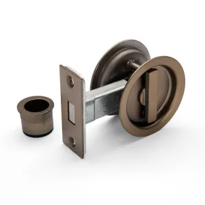 Aged Brass Round Sliding Cavity Privacy Lock by Manovella, a Door Hardware for sale on Style Sourcebook