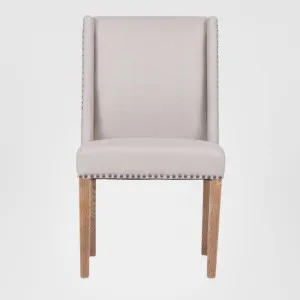 Ithaca Dining Chair Beige W/Studs by OneWorld Collection, a Dining Chairs for sale on Style Sourcebook